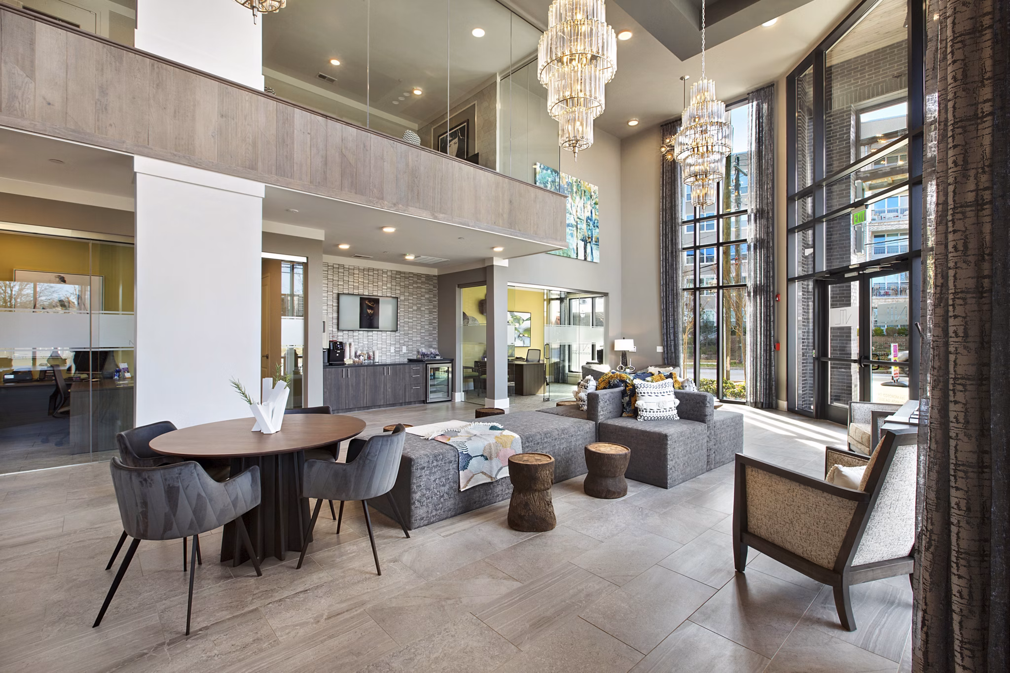 Clubhouse featuring modern decor and seating at Newbergh ATL Apartments