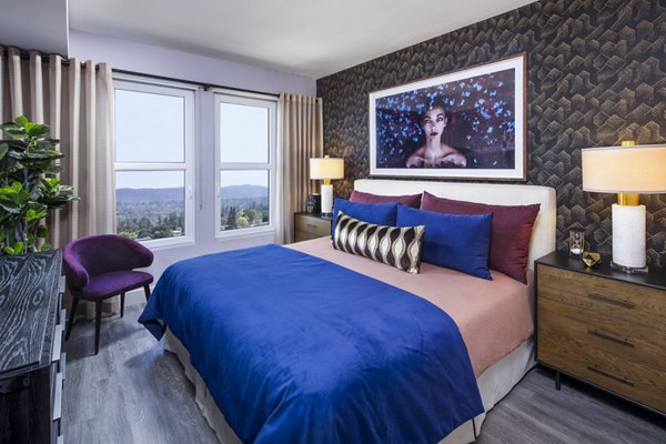 Elegant bedroom featuring modern decor and plush bedding at Highwater Apartments