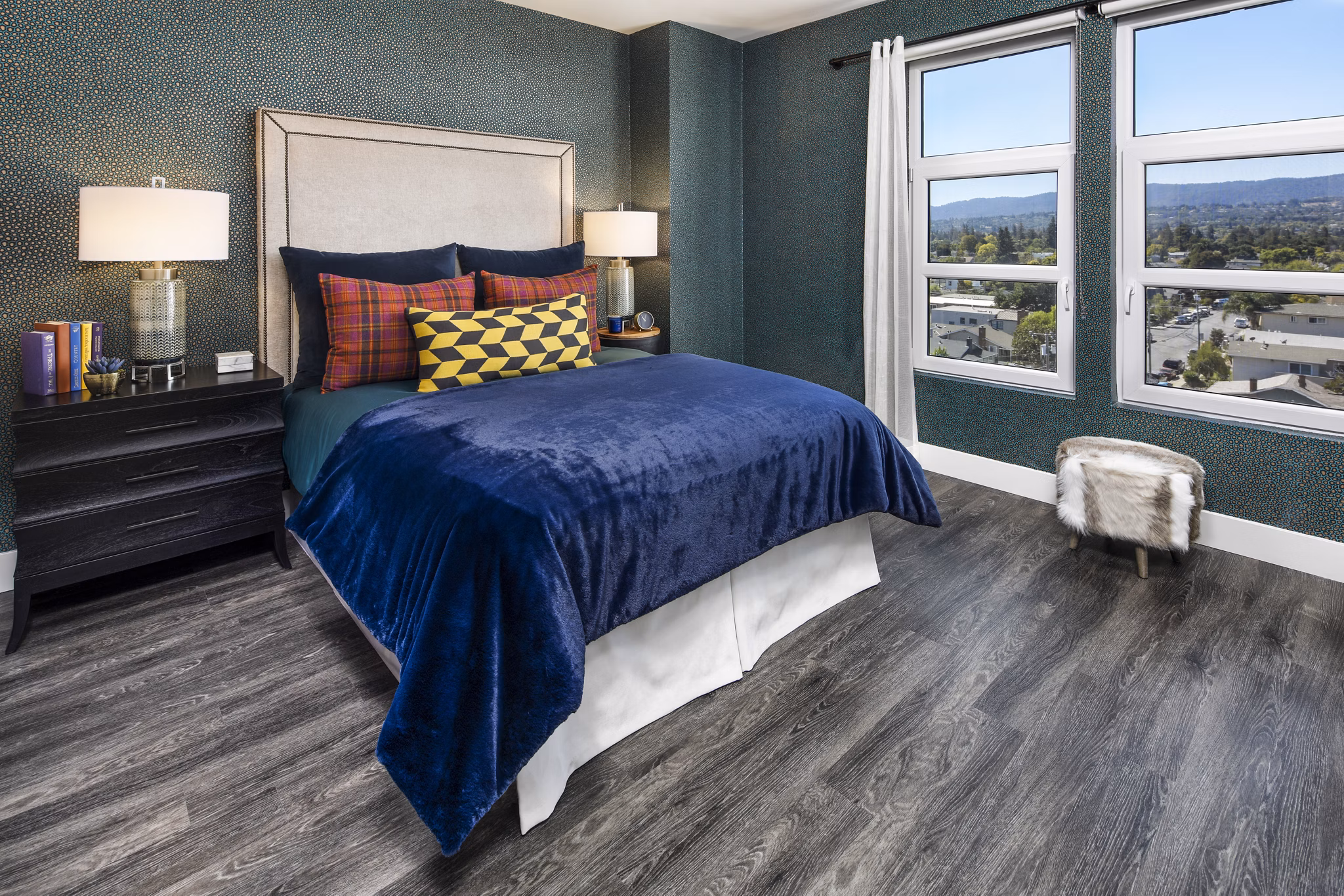 Spacious bedroom with modern decor at Highwater Apartments
