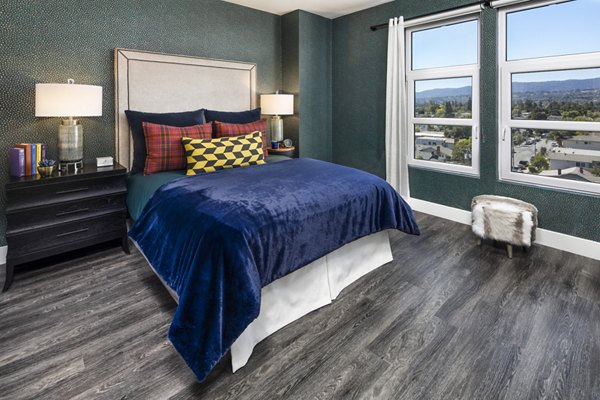 Spacious bedroom with modern decor at Highwater Apartments