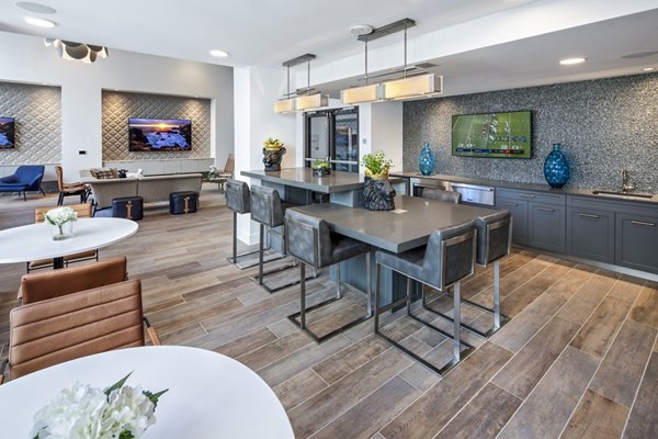 Highwater Apartments: Modern theater with plush seating and state-of-the-art sound system