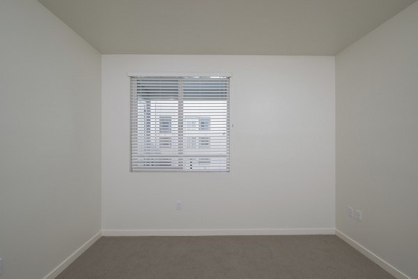 bedroom at Parallel Apartments