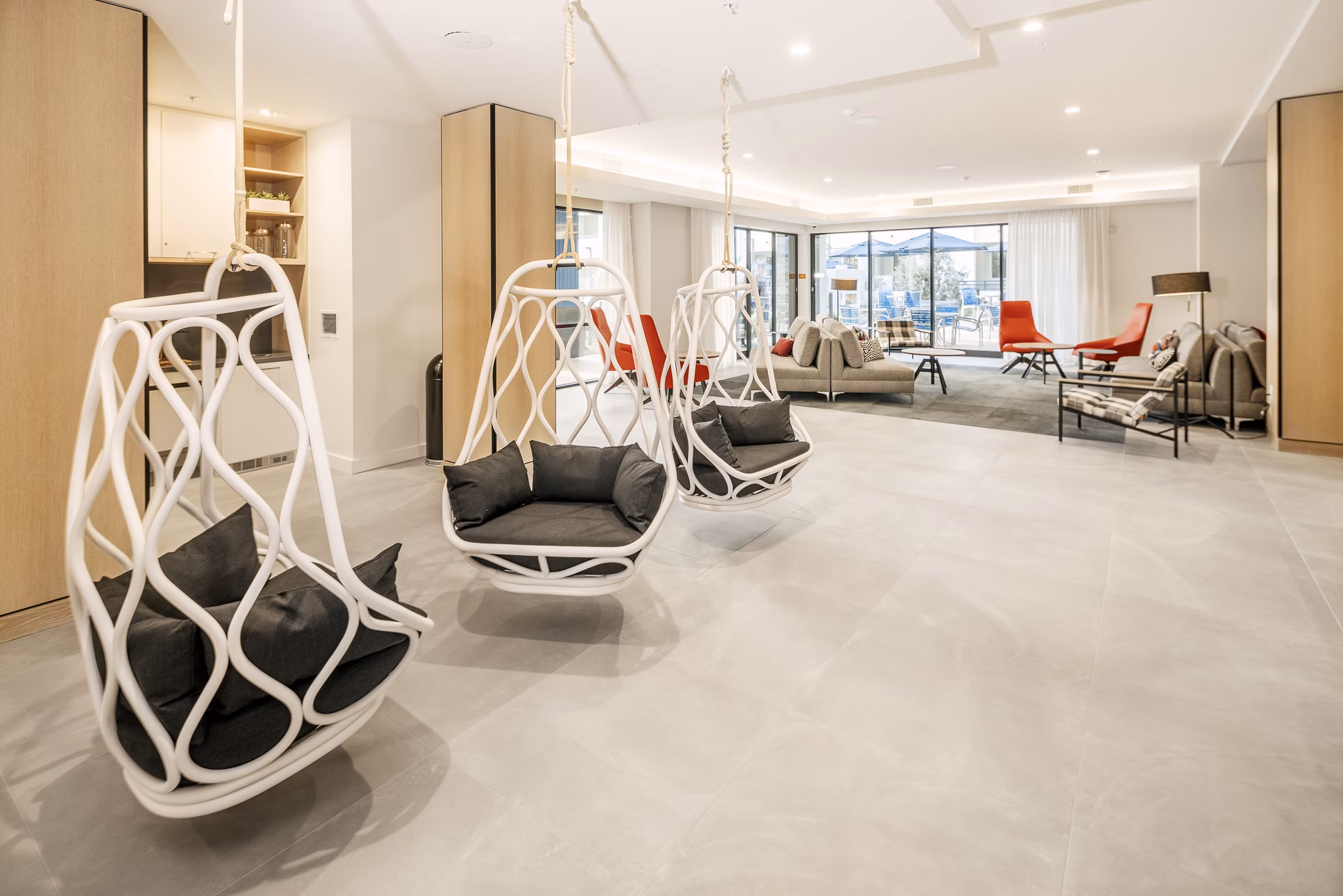 Clubhouse featuring modern furnishings at Parallel Apartments, a Greystar luxury community