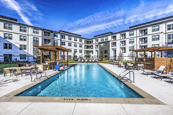 Riverside oasis: Luxury resort-style pool at Overture River District Apartments