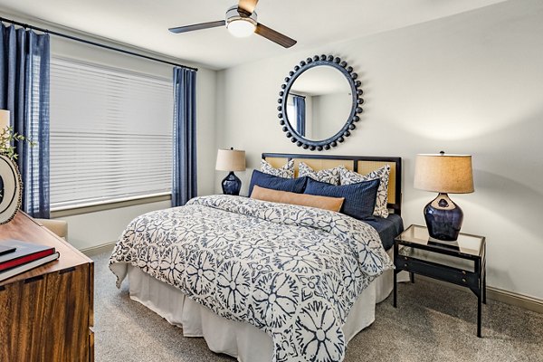 Cozy bedroom with modern decor at Domain Town Center Apartments