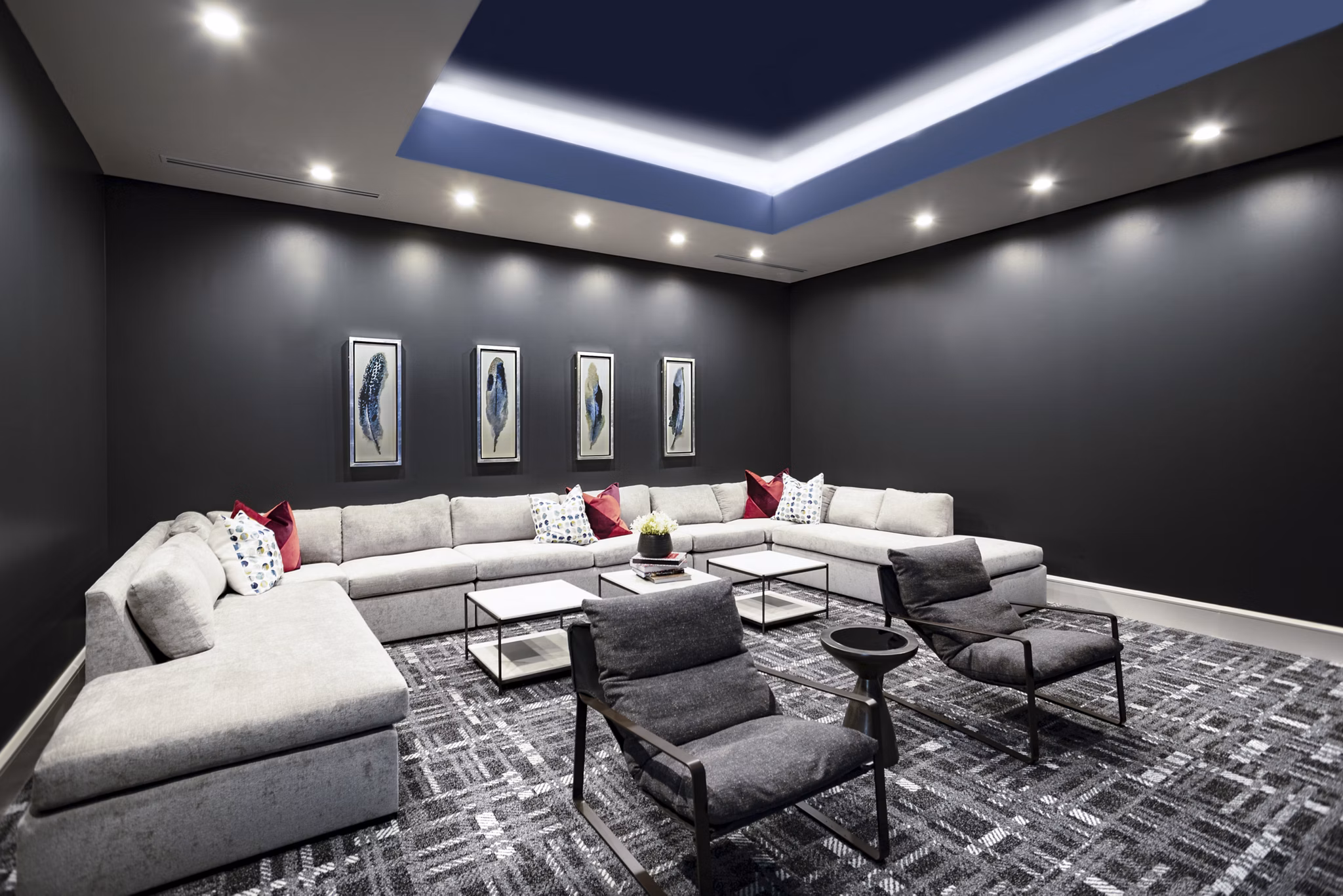 Clubhouse featuring modern design and cozy seating in Domain Town Center Apartments, ideal for social gatherings and relaxation