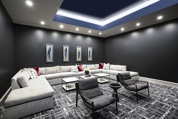 Clubhouse featuring modern design and cozy seating in Domain Town Center Apartments, ideal for social gatherings and relaxation