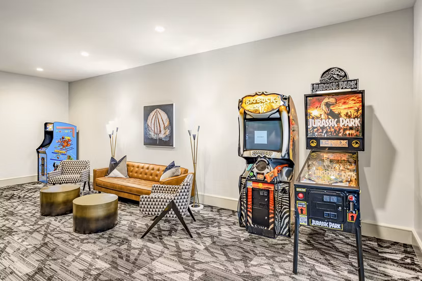 Clubhouse with modern furnishings at Domain Town Center Apartments featuring a spacious layout ideal for residents' gatherings