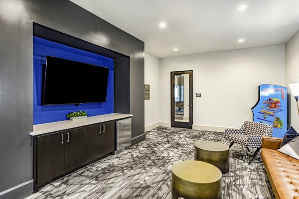 Clubhouse featuring modern design and social spaces at Domain Town Center Apartments