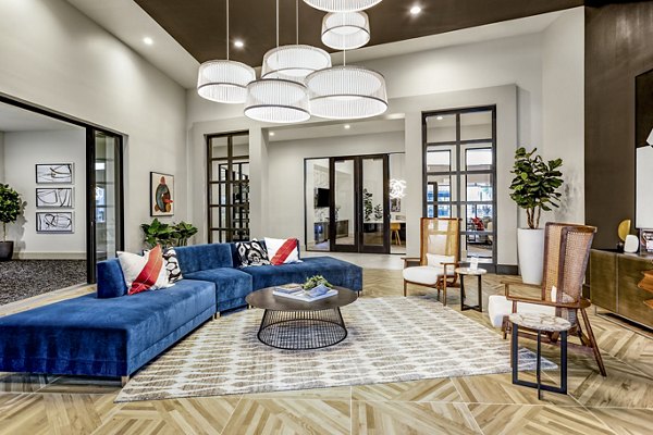Domain Town Center Apartments: Modern clubhouse with stylish seating and entertainment areas for luxury living