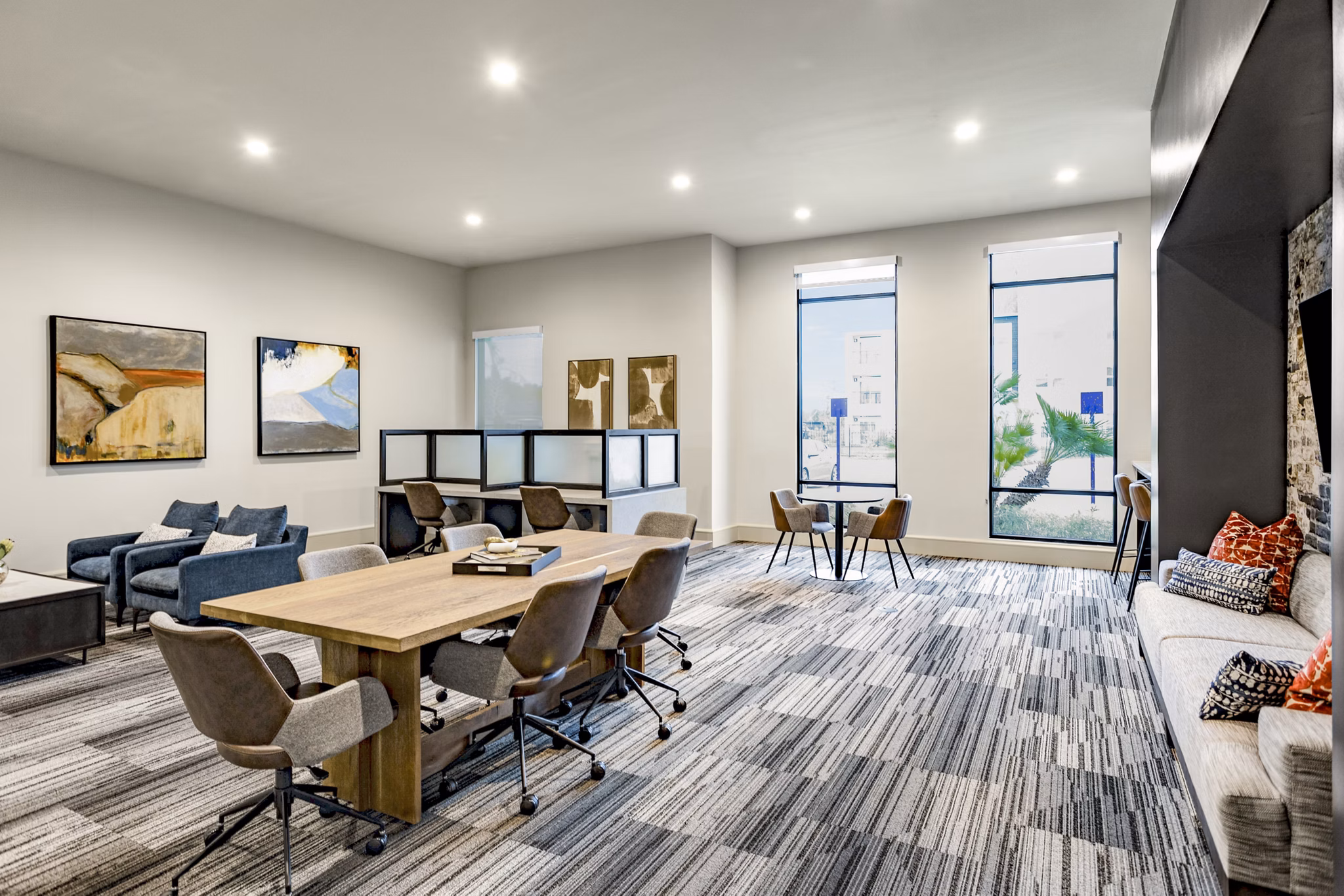 Elegant clubhouse at Domain Town Center Apartments featuring modern design and spacious seating areas for social gatherings