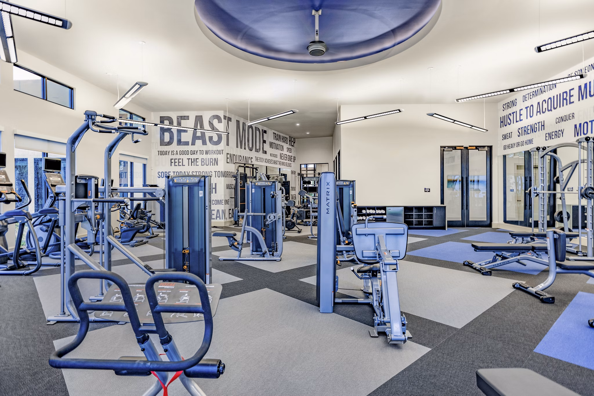 Fitness center featuring state-of-the-art equipment at Domain Town Center Apartments, promoting active and healthy living