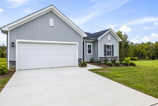 building/townhome exterior at Abode at Geneva Apartment Townhomes