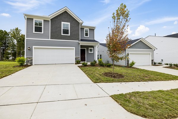 building/townhome exterior at Abode at Geneva Apartment Townhomes