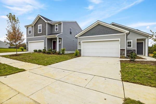 building/townhome exterior at Abode at Geneva Apartment Townhomes