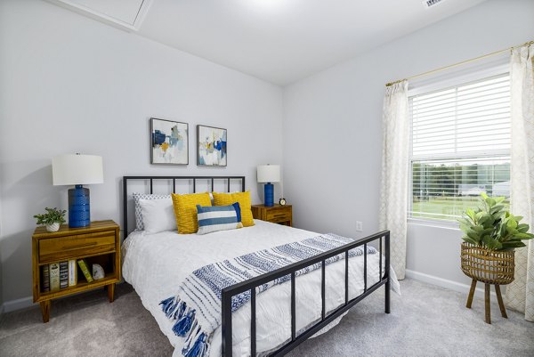 bedroom at Abode at Geneva Apartment Townhomes