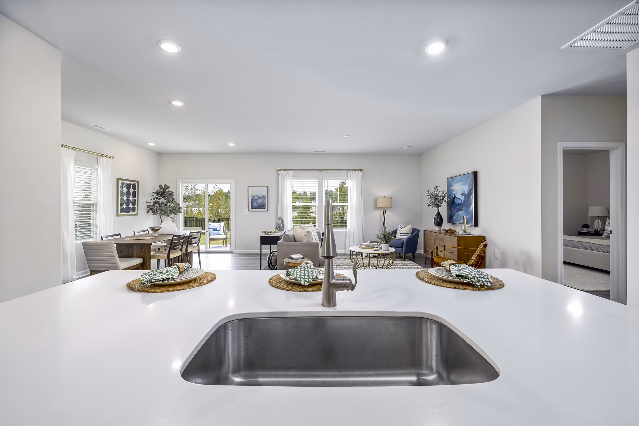 Modern kitchen with stainless steel appliances at Abode at Geneva Apartment Townhomes