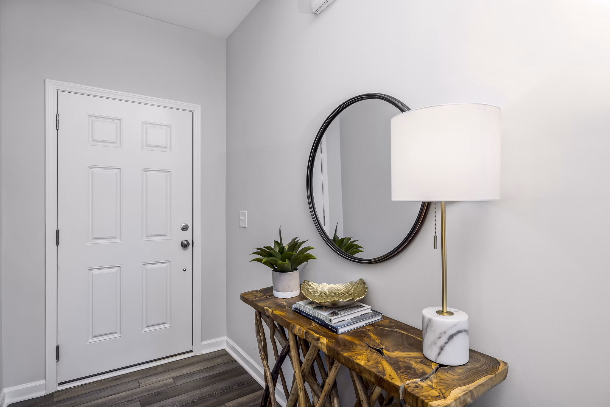 Elegant hallway with stylish decor at Abode at Geneva Apartment Townhomes entrance