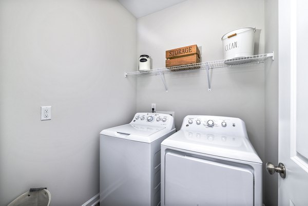 laundry room at Abode at Geneva Apartment Townhomes