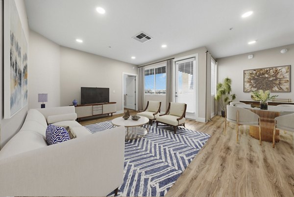 Spacious living room with modern decor in Album Cooley Station Apartments, a luxury Greystar property in a prime location