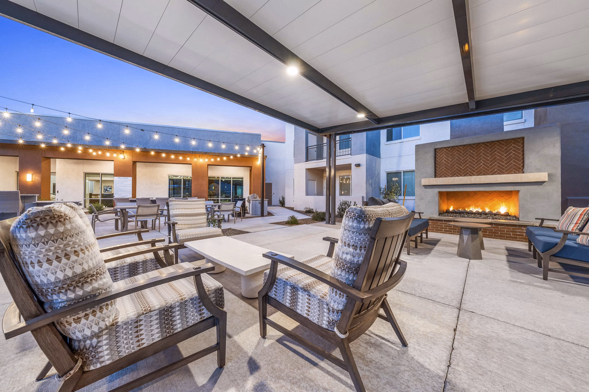 Cozy fire pit on patio at Album Cooley Station Apartments, perfect for evening gatherings