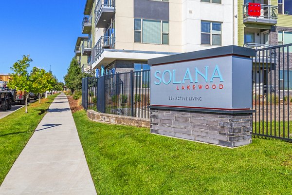 Solana Lakewood Apartments: Modern signage on luxury apartment exterior