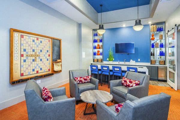 clubhouse game room at Solana Lakewood Apartments