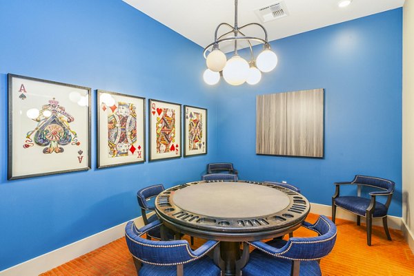 clubhouse game room at Solana Lakewood Apartments