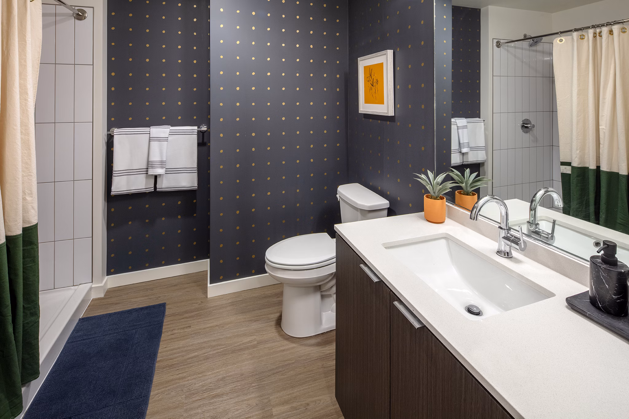 Elegant bathroom with modern fixtures at Sawbuck Apartments