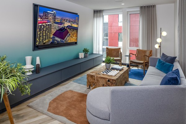 Contemporary clubhouse at Sawbuck Apartments featuring modern design and lounge spaces for community gatherings