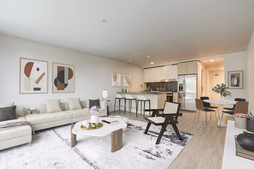 Comfortable living room with modern furnishings at Sawbuck Apartments