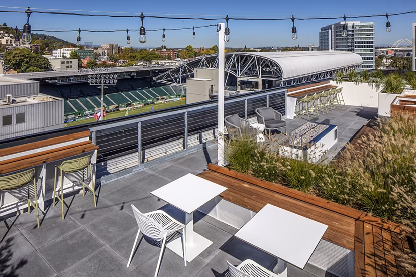 Cozy patio with seating and plants at Sawbuck Apartments