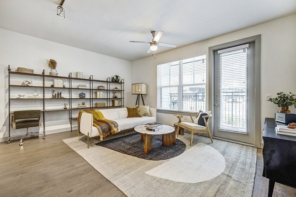 Spacious living room with modern furnishings in Laurel Apartment Homes