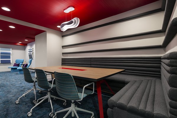 Contemporary clubhouse with lounge seating at Mode Apartments, highlighting modern design and community space