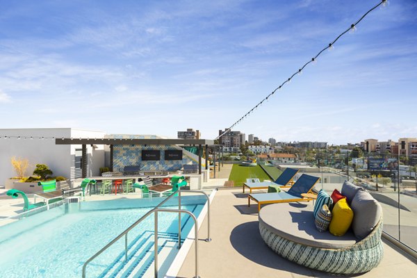 Resort-style rooftop pool with stunning city views at Mode Apartments, offering luxury living in a vibrant urban setting