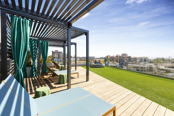 Expansive rooftop deck with city skyline views at Mode Apartments