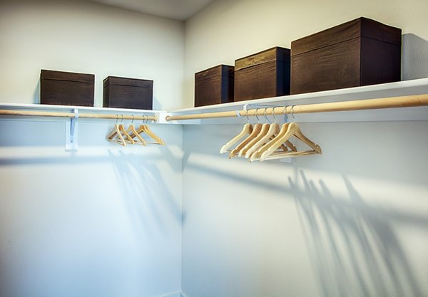 Spacious bedroom closet with ample storage at Ascend at Prairie Village Apartments