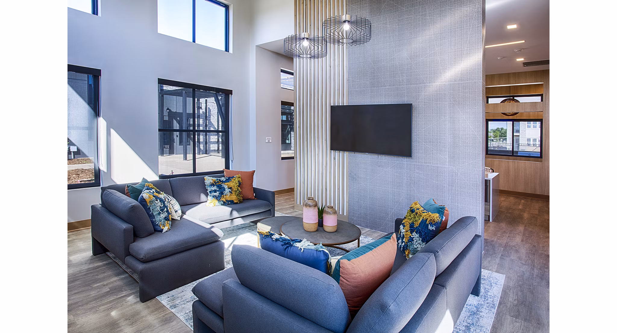 Modern clubhouse/lobby with elegant seating at Ascend at Prairie Village Apartments, ideal for social gatherings and relaxation