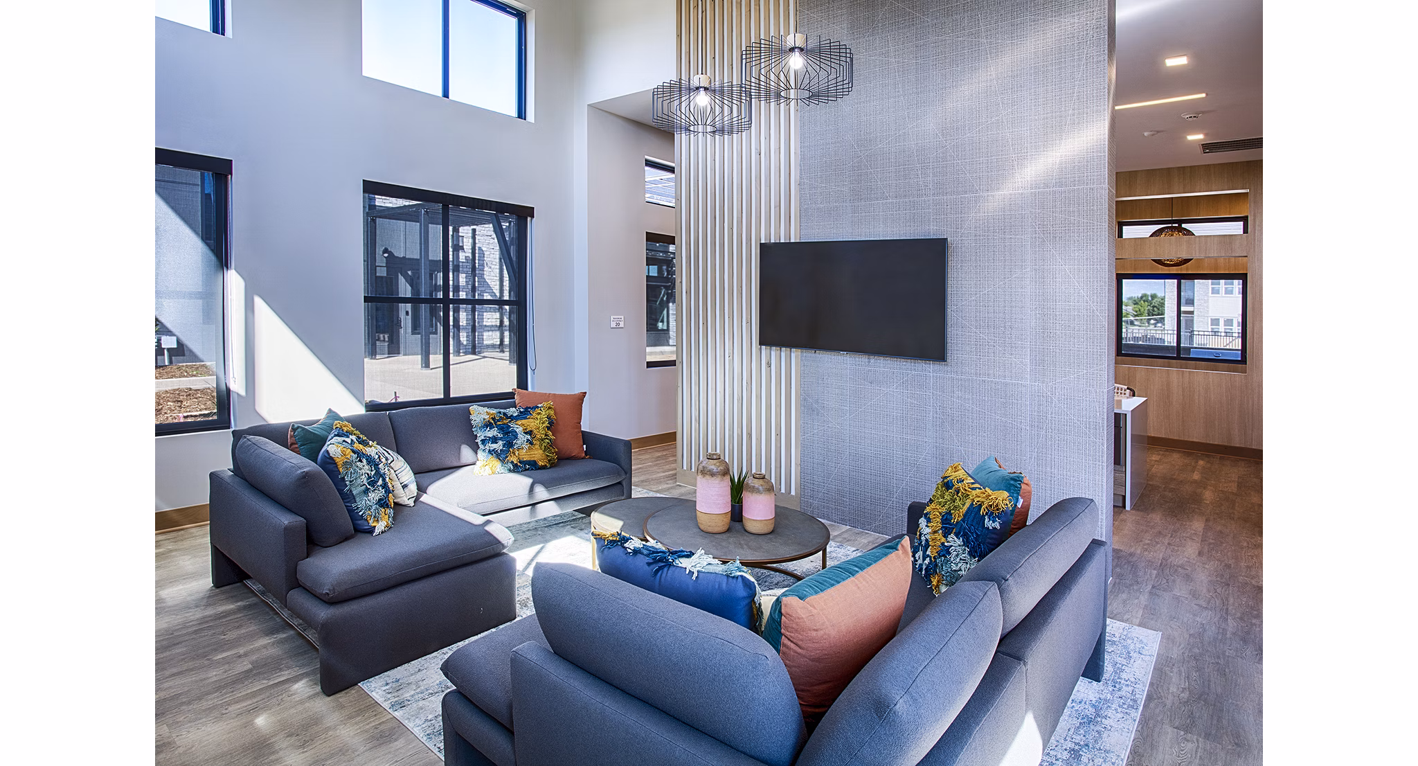 Modern clubhouse/lobby with elegant seating at Ascend at Prairie Village Apartments, ideal for social gatherings and relaxation