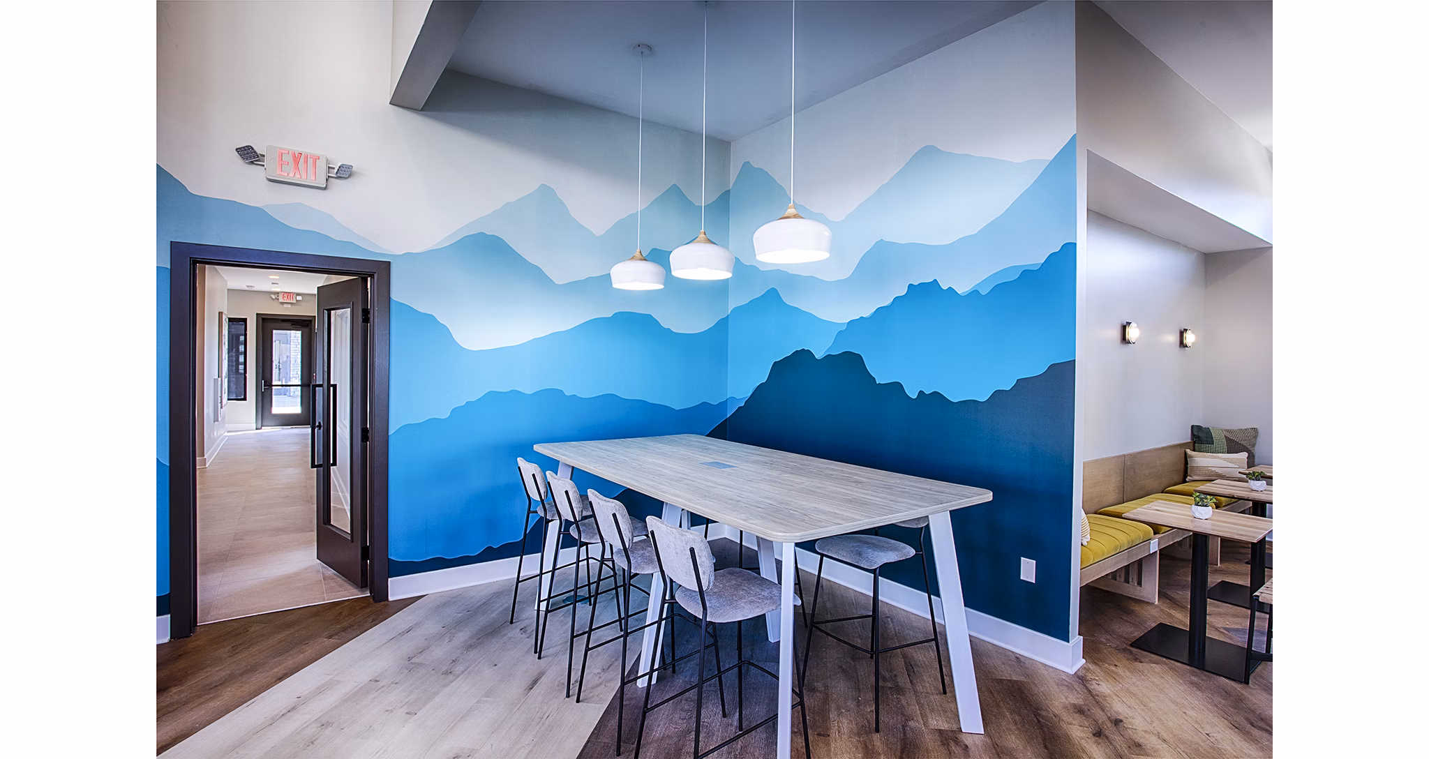 Clubhouse lobby with modern seating and decor at Ascend at Prairie Village Apartments, offering luxury living spaces