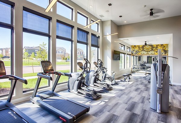 Fitness center with modern equipment at Ascend at Prairie Village Apartments