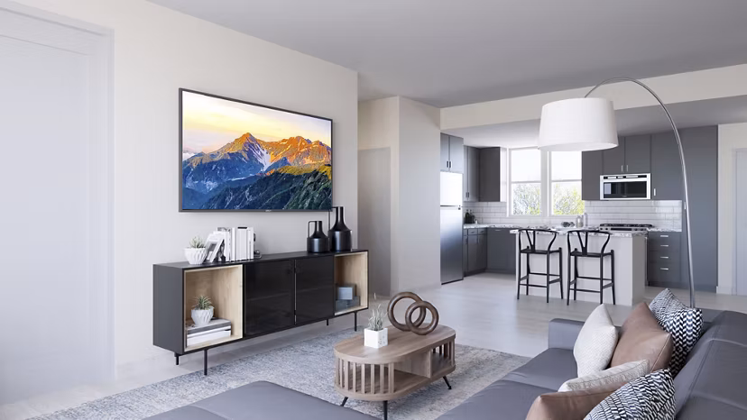 Modern living room with sleek furnishings and natural light at Ascend Prairie Village Apartments