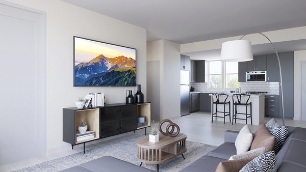 Modern living room with sleek furnishings and natural light at Ascend Prairie Village Apartments