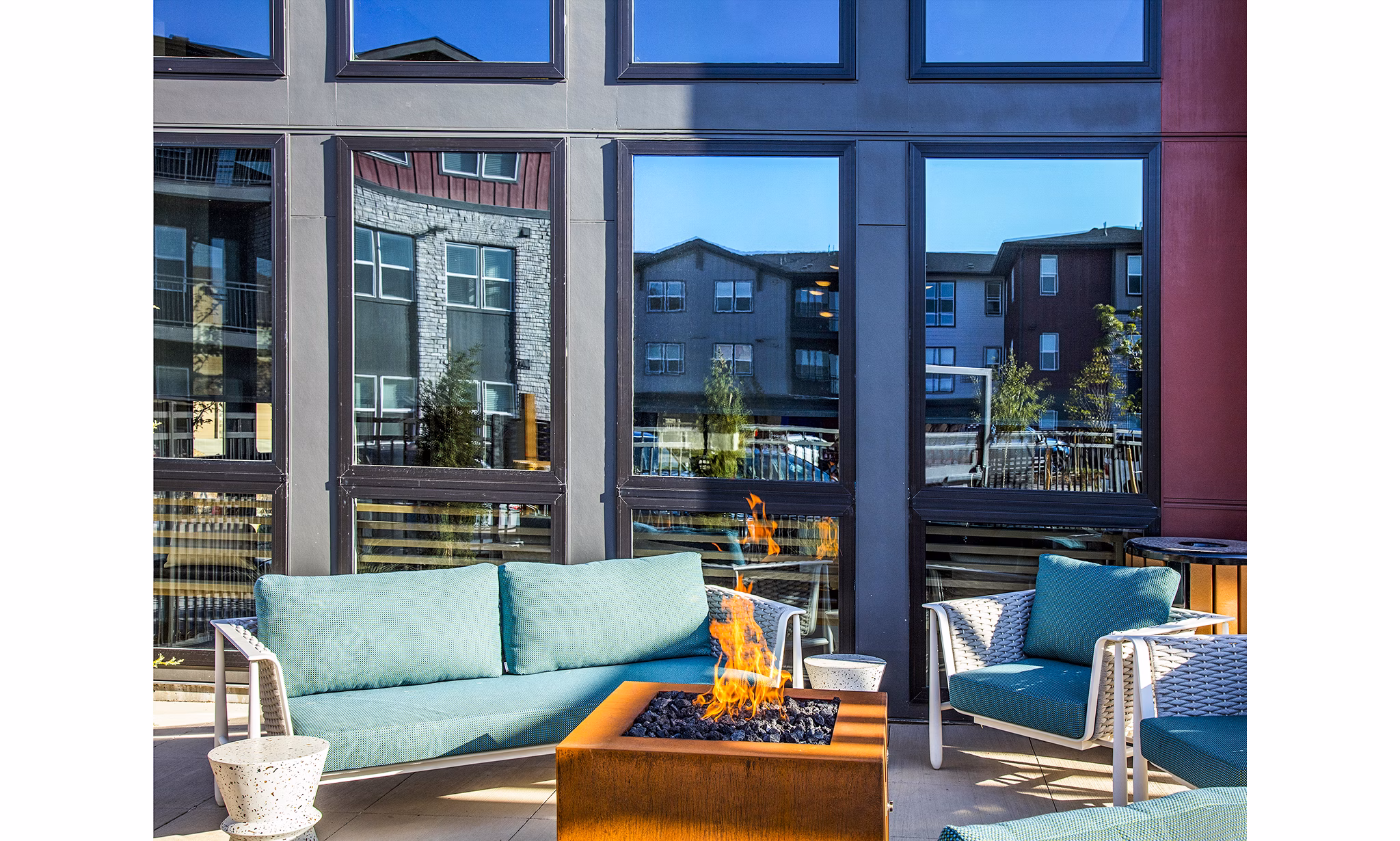 Cozy fire pit at Ascend at Prairie Village Apartments, ideal for outdoor gatherings in a luxurious setting