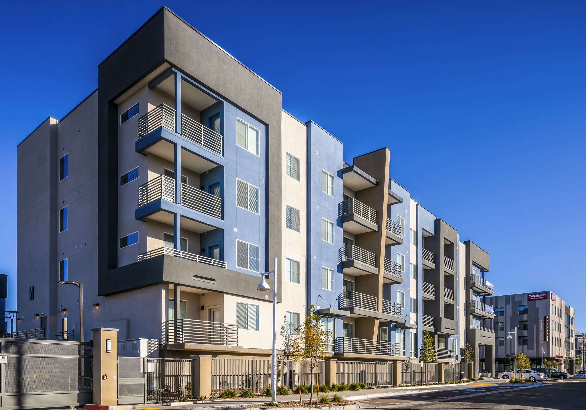 Luxury apartment building with modern design in a vibrant neighborhood