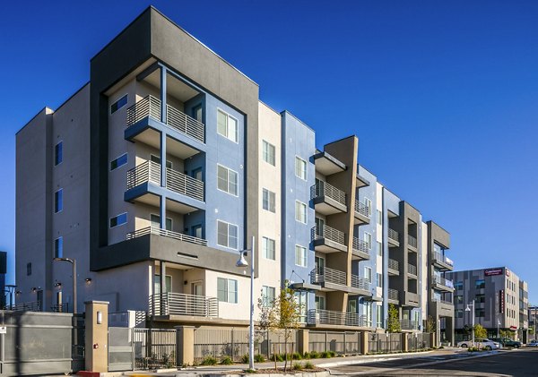 Luxury apartment building with modern design in a vibrant neighborhood