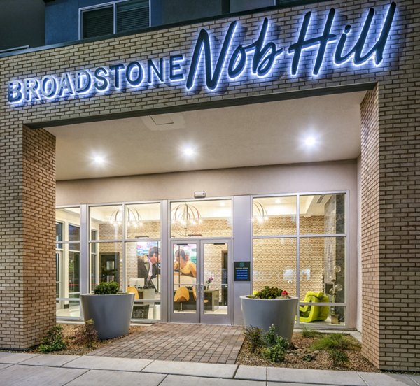 Broadstone Nob Hill: Welcoming entrance with modern architecture and prominent signage in a luxury apartment setting