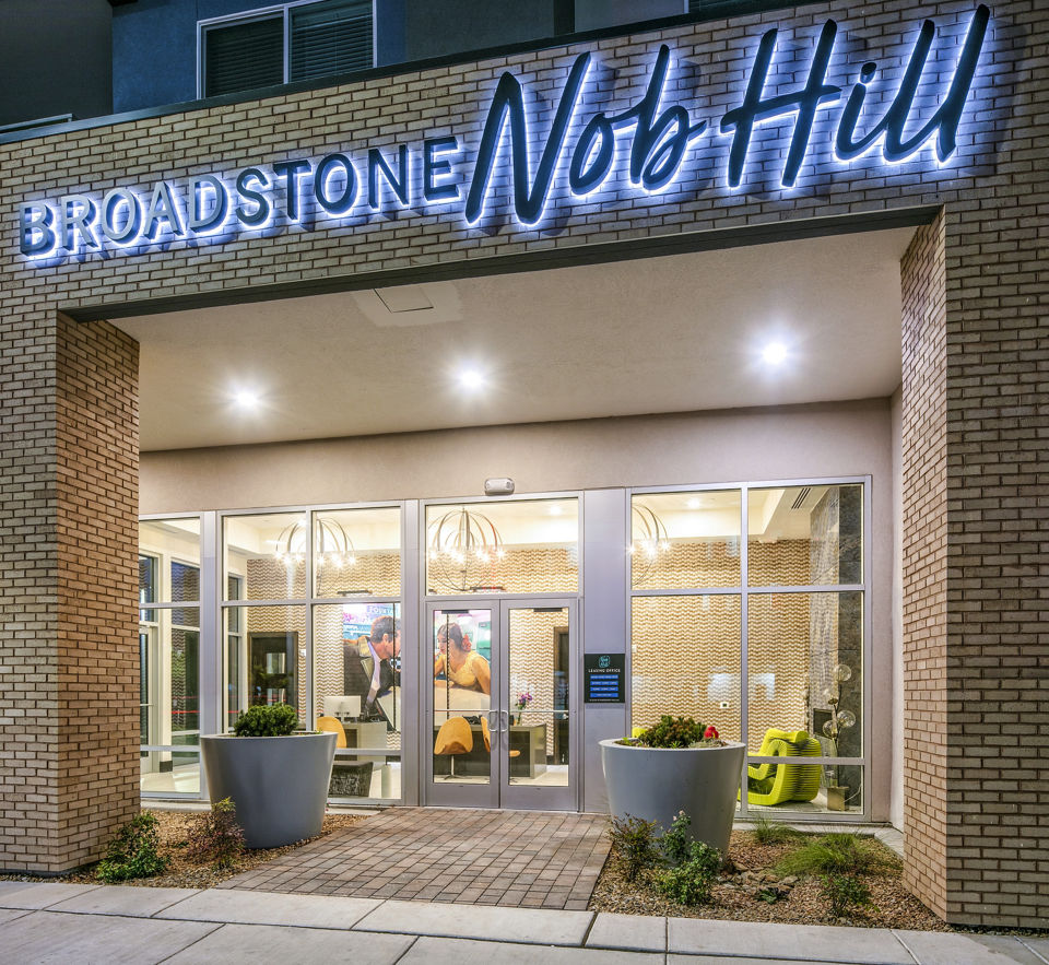 Broadstone Nob Hill: Welcoming entrance with modern architecture and prominent signage in a luxury apartment setting