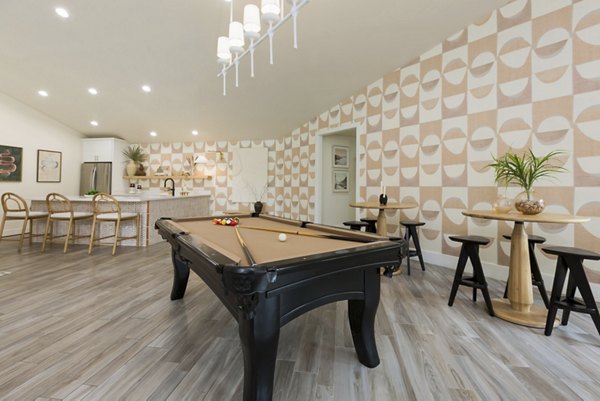 Clubhouse with modern furnishings and stylish decor at The Joshua Apartments
