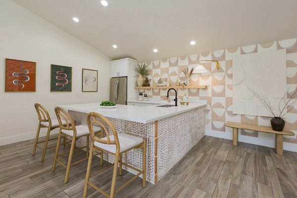 Modern clubhouse with lounge seating at The Joshua Apartments